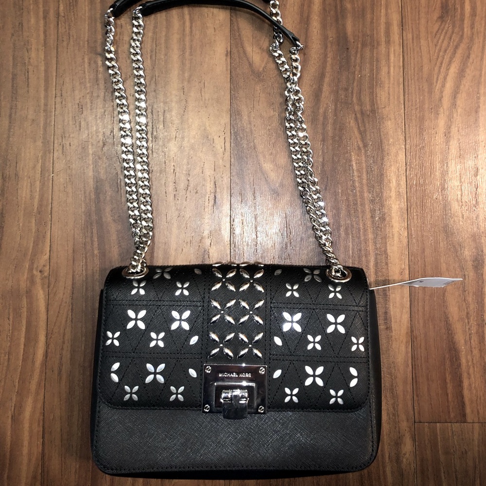 Michael Kors black purse with metallic decoration
